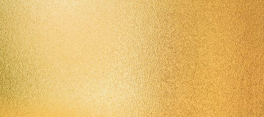 Gold texture with yellow foil luxury shiny golden background, horizontal