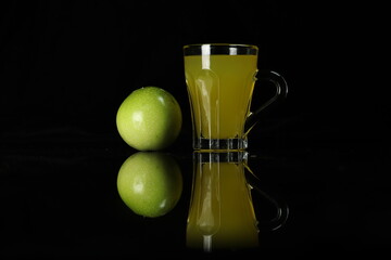 glass of juice and fruits