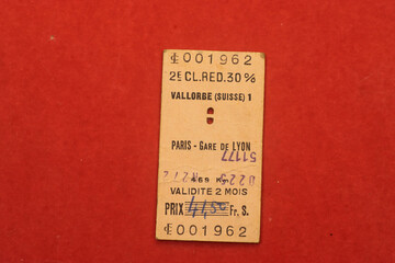 antique old ticket train from Swiss isolated on red background