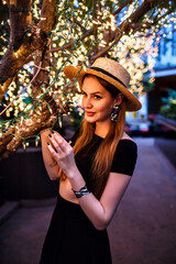 Sexy elegant woman posing at luxury hotel