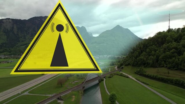EMF signal warning warning sign radio 5G 6G waves of communication tower. Landscape shot, network signal