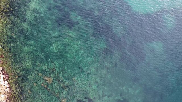 Clear azure sea amazing view , zoom out smooth top view 4k