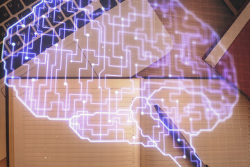 Double exposure of brain drawing hologram over topview work table background with computer. Concept of big data.