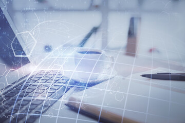 Fototapeta premium Double exposure of map drawing and desktop with coffee and items on table background. Concept of global data.