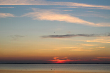 Fototapeta premium Wadden Sea: the sunset over the island of Langeoog - a play of colors