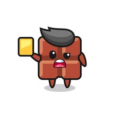 cartoon chocolate bar character as a football referee giving a yellow card