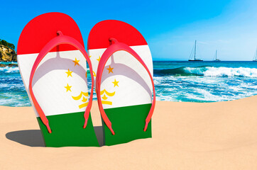 Flip flops with Tajik flag on the beach. Tajikistan resorts, vacation, tours, travel packages concept. 3D rendering
