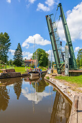 Bascule bridge open up for a sailboat at Tatorp in gota canal, Sweden