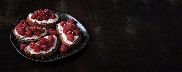 Delicious toast with raspberries and shrimp cheese. Healthly food. Keto toast.