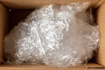 Cellophane filling in an open cardboard box