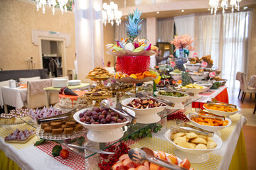 table with fruit at a buffet in the hotel on vacation