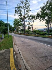 Fototapeta na wymiar Sunset view at the road side in Singapore near Changi Village
