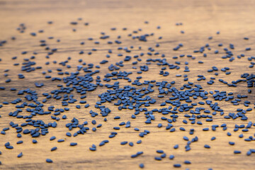 Sesame, Close-up black sesame seeds on a wooden table for healthy food and diet concepts.