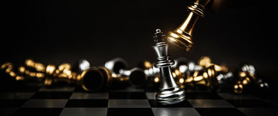 Close up king chess to challenge battle fighting on chess board concepts of leadership and business...