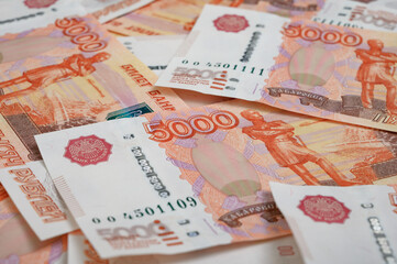 5000 rubles background. Russian banknotes at different angles.