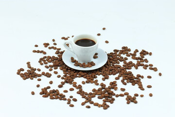 Coffee cup and beans on a white background.