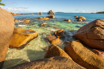 sunrise at tropical beach anse lazio on praslin on the seychelles