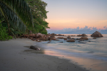 sunrise at tropical beach anse lazio on praslin on the seychelles