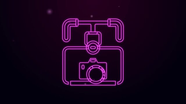 Glowing neon line Gimbal stabilizer with DSLR camera icon isolated on black background. 4K Video motion graphic animation