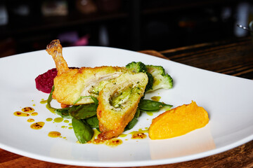 Kiev cutlet on a plate on the background of the kitchen