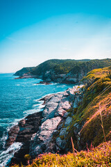 Conch Beach Mountains that contrast with the breakwater