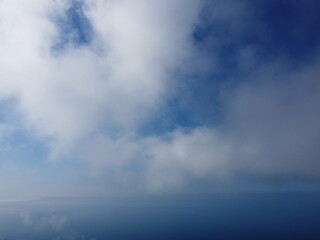 Abstract aerial nature summer ocean sunset sea and sky background. Natural sky with puffy Cumulus...