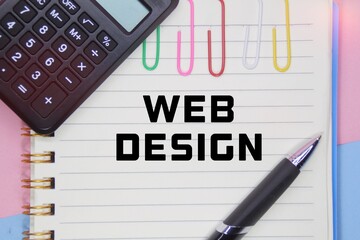 notebooks, pens, calculators and web design words