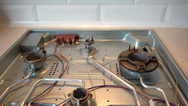 stove repair in the kitchen . oven repair
