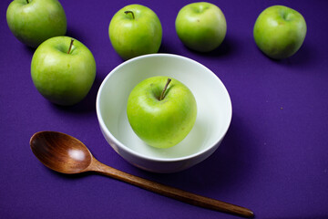 green apple on a plate