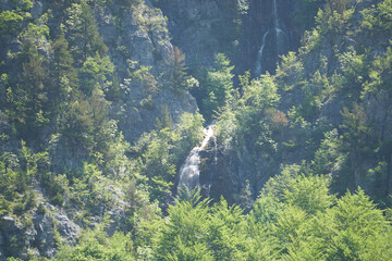 Fototapeta na wymiar Waterfall in the mountains in Theth in the Albanian alps