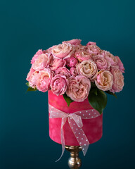 bouquet pink rose tube blue background