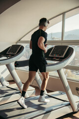 man at the gym doing exercise on the treadmill