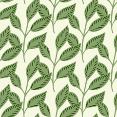 Isolated seamless pattern with doodle spring leaf branches green ornament. White background. Decor print.