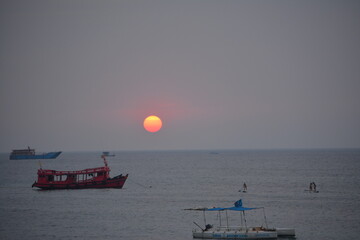 fishing boat at sunset
