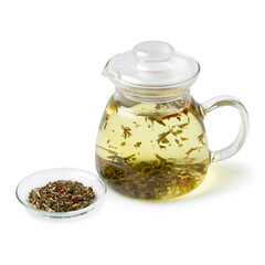  Glass teapot with a mixture of healthy herbal tea on white background