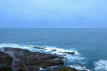 High cliff mountain and sea offshore