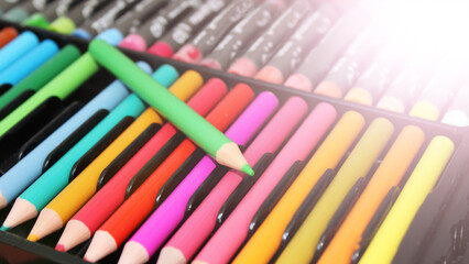 Green Pencil among other colored pencils, Drawing set