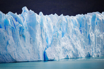 Perito Moreno glacier ice break and lake. Huge wall of ice