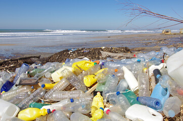 Water pollution. Plastics, bags, bottles, wastes accumulates on the beach of french Atlantic west coast. 