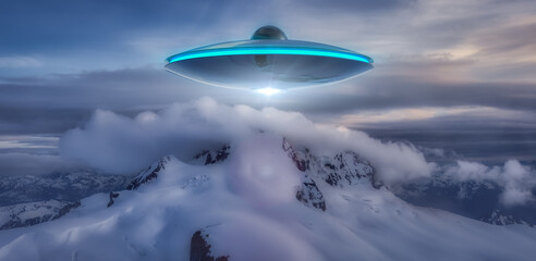 Naklejka na ściany i meble UFO Flying over the Canadian Rocky Mountain Landscape. Art Composite. Aerial Background from British Columbia, Canada, near Vancouver.