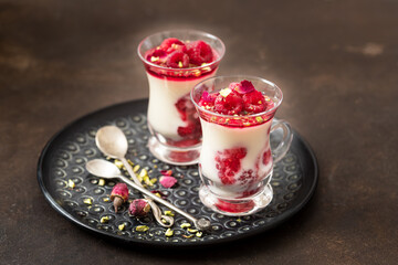 Healthy breakfast: yogurt parfait with  fresh raspberries