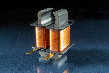 Electric condenser for household appliances on the table with reflection
