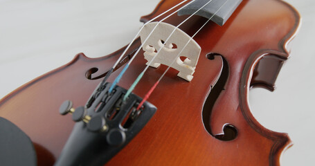 Fototapeta premium Violin string and bridge close up