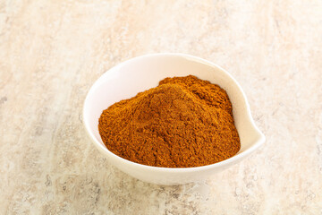 Dry Paprika powder in the bowl