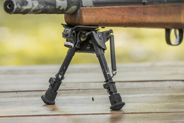 Wooden sniper rifle with scope and bipod