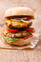 cheeseburger on wood