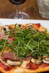 pizza with fresh arugula