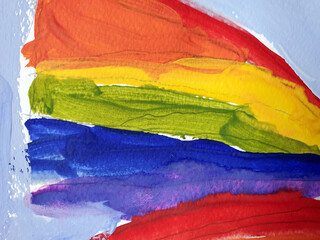 Colorful brushpaint strokes on paper surface. Painted texture of rainbow stripes