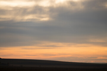 Beautiful clouds at sunset or sunrise, background