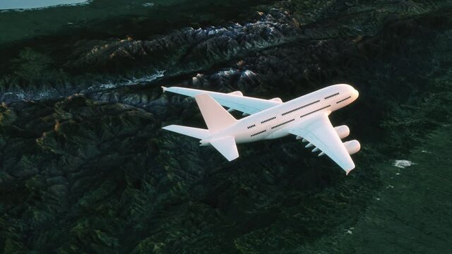 Close up of a large passenger plane is flying over the mountains. Aerial view of a plane above the green mountains. The bright sun flares are run on the plane. The air is clean, there are no clouds.